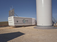 A large crane assembles a wind turbine in the rolling hills of Castelluccio dei Sauri, Foggia, Italy, on November 1, 2024. This wind farm ex...