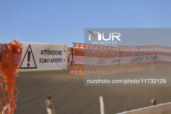 A large crane assembles a wind turbine in the rolling hills of Castelluccio dei Sauri, Foggia, Italy, on November 1, 2024. This wind farm ex...