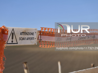 A large crane assembles a wind turbine in the rolling hills of Castelluccio dei Sauri, Foggia, Italy, on November 1, 2024. This wind farm ex...