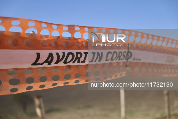 A large crane assembles a wind turbine in the rolling hills of Castelluccio dei Sauri, Foggia, Italy, on November 1, 2024. This wind farm ex...