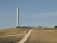 A large crane assembles a wind turbine in the rolling hills of Castelluccio dei Sauri, Foggia, Italy, on November 1, 2024. This wind farm ex...