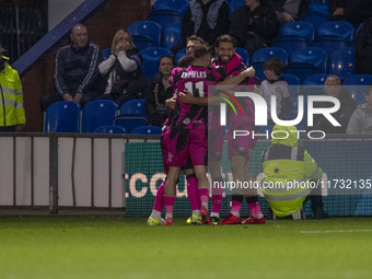 Christian Doidge #9 of Forest Green Rovers F.C. celebrates his goal with teammates during the FA Cup First Round match between Stockport Cou...