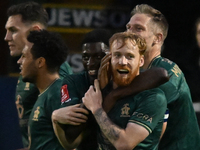 James Brophy (7, Cambridge United) celebrates after scoring the team's first goal during the FA Cup First Round match between Woking and Cam...