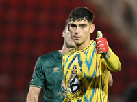 Goalkeeper Vincente Reyes of Cambridge United stands after the final whistle during the FA Cup First Round match between Woking and Cambridg...