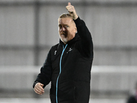 Manager Garry Monk, the manager of Cambridge United, gives a thumbs up to fans after the final whistle during the FA Cup First Round match b...