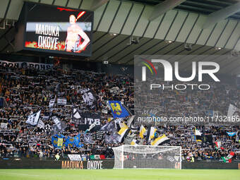 Udinese's supporters attend the Italian Serie A Enilive soccer championship football match between Udinese Calcio and Juventus FC at Bluener...