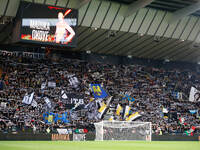 Udinese's supporters attend the Italian Serie A Enilive soccer championship football match between Udinese Calcio and Juventus FC at Bluener...