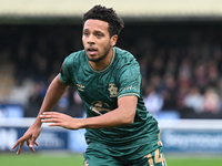 Korey Smith (14 Cambridge United) moves forward during the FA Cup First Round match between Woking and Cambridge United at the Kingfield Sta...