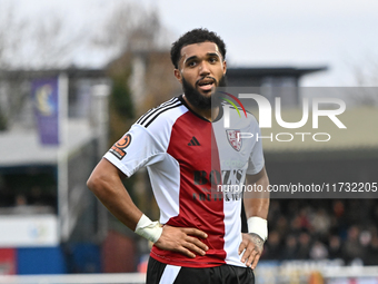 Deon Moore (14 Woking) looks on during the FA Cup First Round match between Woking and Cambridge United at the Kingfield Stadium in Woking,...