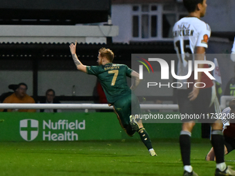 James Brophy (7, Cambridge United) celebrates after scoring the team's first goal during the FA Cup First Round match between Woking and Cam...