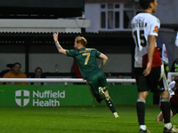 James Brophy (7, Cambridge United) celebrates after scoring the team's first goal during the FA Cup First Round match between Woking and Cam...