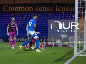 Kyle Wootton #19 of Stockport County F.C. scores a goal during the FA Cup First Round match between Stockport County and Forest Green Rovers...