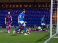 Kyle Wootton #19 of Stockport County F.C. scores a goal during the FA Cup First Round match between Stockport County and Forest Green Rovers...