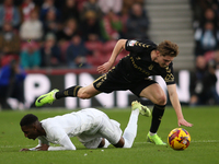 Jack Rudoni of Coventry City fouls Isaiah Jones of Middlesbrough during the Sky Bet Championship match between Middlesbrough and Coventry Ci...