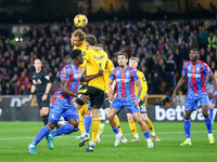 Craig Dawson (#15) and Santiago Bueno (#4) of Wolves go up for the ball during the Premier League match between Wolverhampton Wanderers and...