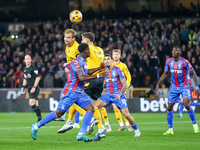 Craig Dawson (#15) and Santiago Bueno (#4) of Wolves go up for the ball during the Premier League match between Wolverhampton Wanderers and...