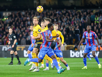 Craig Dawson (#15) and Santiago Bueno (#4) of Wolves go up for the ball during the Premier League match between Wolverhampton Wanderers and...