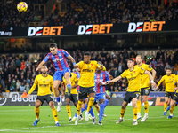 Number 12, Daniel Munoz of Crystal Palace (second from left), heads the ball during the Premier League match between Wolverhampton Wanderers...