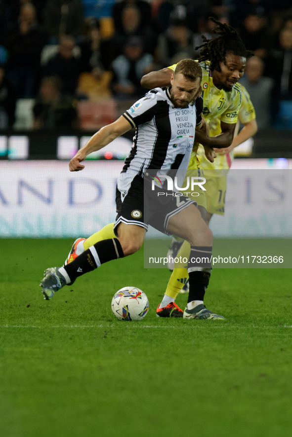 Jesper Karlstrom of Udinese plays against Khephren Thuram of Juventus during the Italian Serie A Enilive soccer championship match between U...