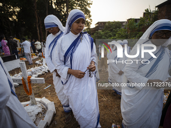 Nuns offer prayers on the grave during the All Souls' Day observation in Guwahati, India, on November 2, 2024. All Souls' Day is a Christian...