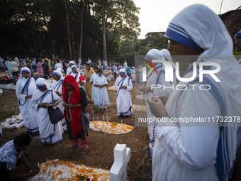 Nuns offer prayers on the grave during the All Souls' Day observation in Guwahati, India, on November 2, 2024. All Souls' Day is a Christian...