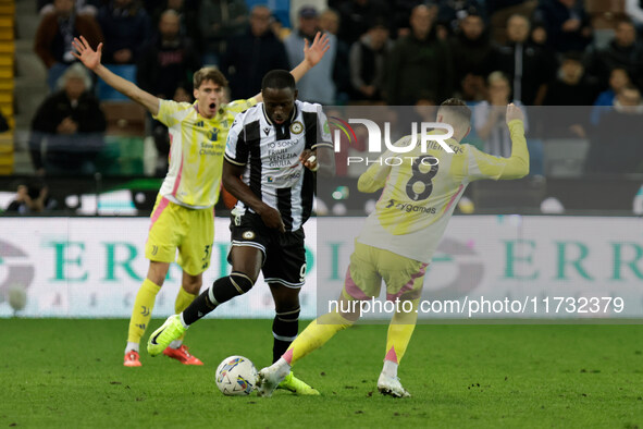 Keinan Davis of Udinese plays against Teun Koopmeiners of Juventus during the Italian Serie A Enilive soccer championship match between Udin...