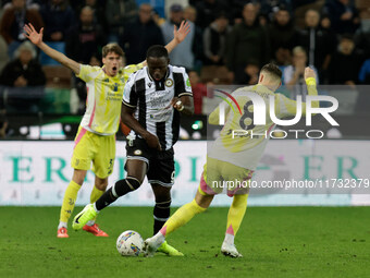 Keinan Davis of Udinese plays against Teun Koopmeiners of Juventus during the Italian Serie A Enilive soccer championship match between Udin...