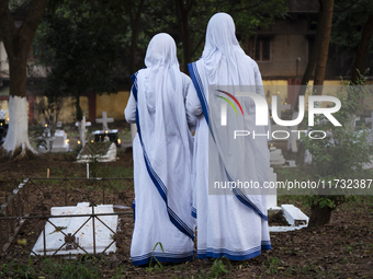 Nuns offer prayers on the grave during the All Souls' Day observation in Guwahati, India, on November 2, 2024. All Souls' Day is a Christian...