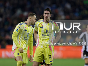 Dusan Vlahovic of Juventus participates in the Italian Serie A Enilive soccer championship football match between Udinese Calcio and Juventu...