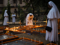 Nuns offer prayers on the grave during the All Souls' Day observation in Guwahati, India, on November 2, 2024. All Souls' Day is a Christian...