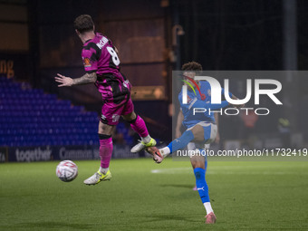 Odin Bailey, number 27 of Stockport County F.C., takes a shot at goal during the FA Cup First Round match between Stockport County and Fores...