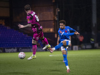 Odin Bailey, number 27 of Stockport County F.C., takes a shot at goal during the FA Cup First Round match between Stockport County and Fores...