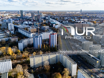 A drone captures a view of the city from Holzmarkt towards Warschauer Brucke with the headquarters of the BVG (corner down left) in Berlin,...