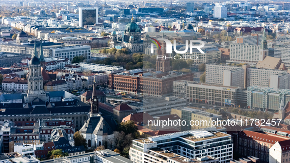 A drone captures a view of the town hall (C-R) and cathedral (C-L) in Berlin, Germany, on November 2, 2024. 