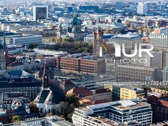 A drone captures a view of the town hall (C-R) and cathedral (C-L) in Berlin, Germany, on November 2, 2024. (