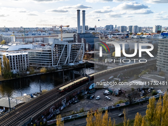 A drone captures a view of the River Spree and the east-west railroad from the Holzmarkt in Berlin, Germany, on November 2, 2024. (