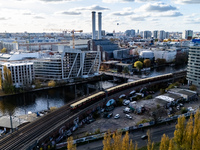 A drone captures a view of the River Spree and the east-west railroad from the Holzmarkt in Berlin, Germany, on November 2, 2024. (