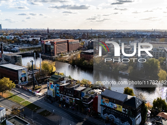 A drone captures a view of the river Spree by the Holzmarkt in Berlin, Germany, on November 2, 2024. (