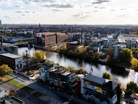 A drone captures a view of the river Spree by the Holzmarkt in Berlin, Germany, on November 2, 2024. (