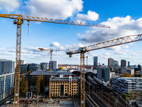 A drone captures a view of a construction site and cranes in the area of Holzmarktstrasse in Berlin, Germany, on November 2, 2024. (