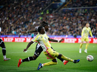 Timothy Weah of Juventus plays against Kingsley Ehizibue of Udinese during the Italian Serie A Enilive soccer championship match between Udi...