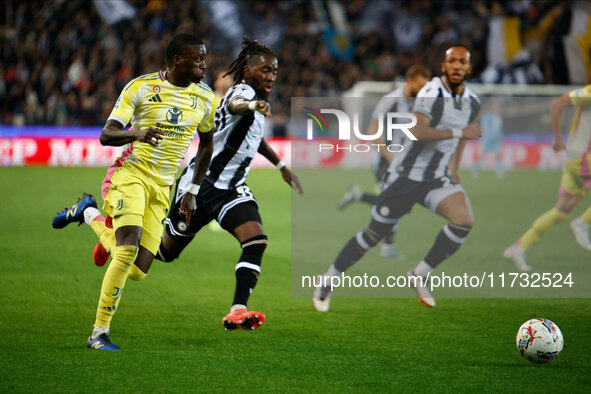 Timothy Weah of Juventus plays against Kingsley Ehizibue of Udinese during the Italian Serie A Enilive soccer championship match between Udi...