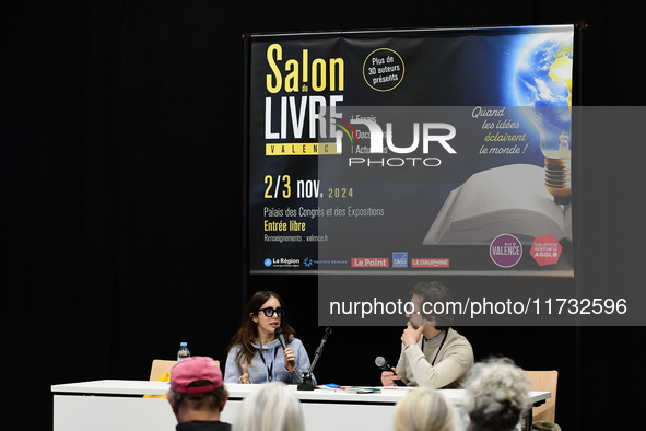 Aurelie Jean, a businesswoman, attends the first book fair in Valence, Drome, on November 2, 2024. 