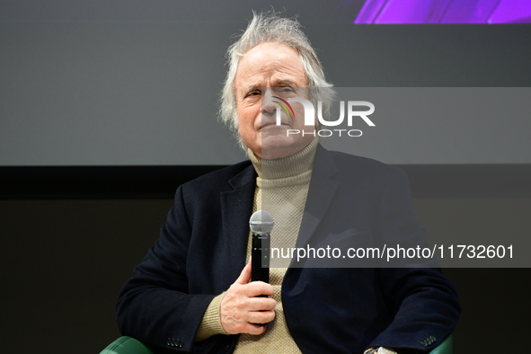 Franz Olivier Giesbert and Thomas Rabino attend the first book fair in Valence, Drome, on November 2, 2024. 