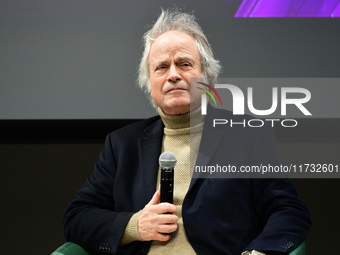 Franz Olivier Giesbert and Thomas Rabino attend the first book fair in Valence, Drome, on November 2, 2024. (