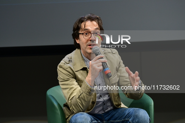 Franz Olivier Giesbert and Thomas Rabino attend the first book fair in Valence, Drome, on November 2, 2024. 