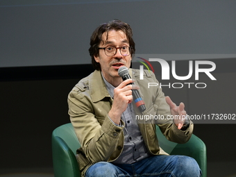 Franz Olivier Giesbert and Thomas Rabino attend the first book fair in Valence, Drome, on November 2, 2024. (