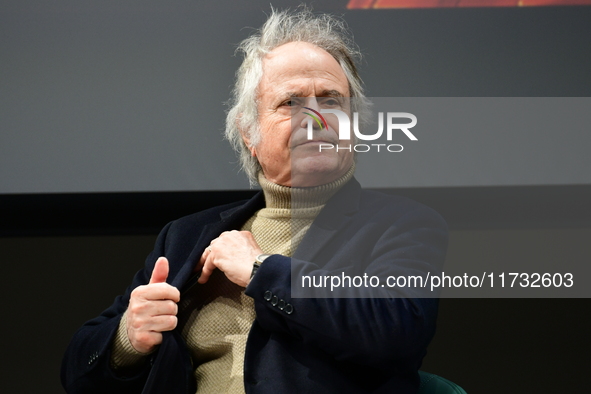 Franz Olivier Giesbert and Thomas Rabino attend the first book fair in Valence, Drome, on November 2, 2024. 