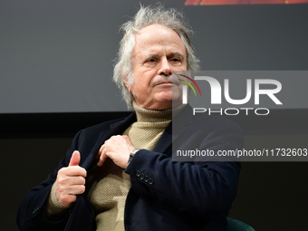 Franz Olivier Giesbert and Thomas Rabino attend the first book fair in Valence, Drome, on November 2, 2024. (