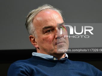 Alain Marschall and Olivier Truchot attend the first book fair in Valence, Drome, on November 2, 2024. (